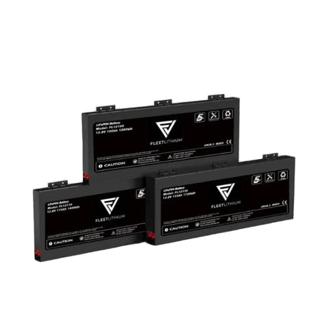 Fleet Lithium 48V Stackable Wall Mounted Solar Battery System showing three black battery units stacked, with the Fleet Lithium logo and warning labels visible.