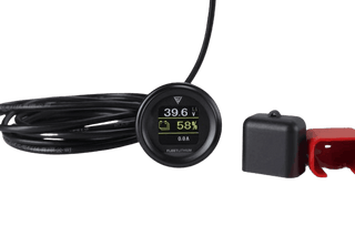 Fleet Lithium Textron / Tracker Prowler EV (2017-2021) (72V) Fleet Lithium Conversion Kit digital state-of-charge gauge displaying 39.6V and 58% charge, with battery terminal covers next to it.