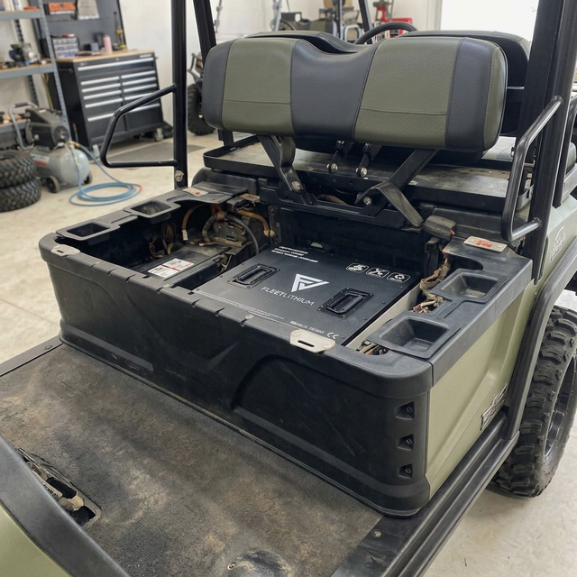 Side view of the Fleet Lithium 72V battery with Bad Boy Buggies Ambush/XT kit